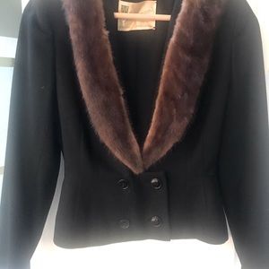 Vintage black jacket with genuine fur.